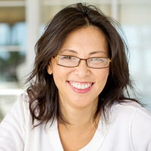 Portrait of an Asian woman laughing and smiling